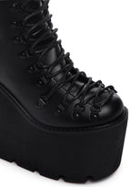 Traitor Boots